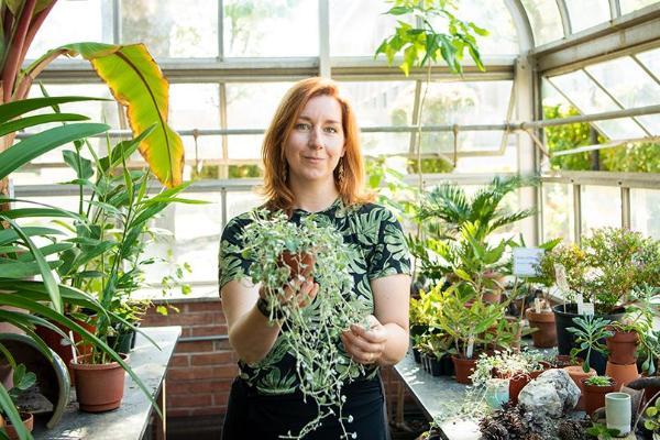 laura wyeth holding a plant